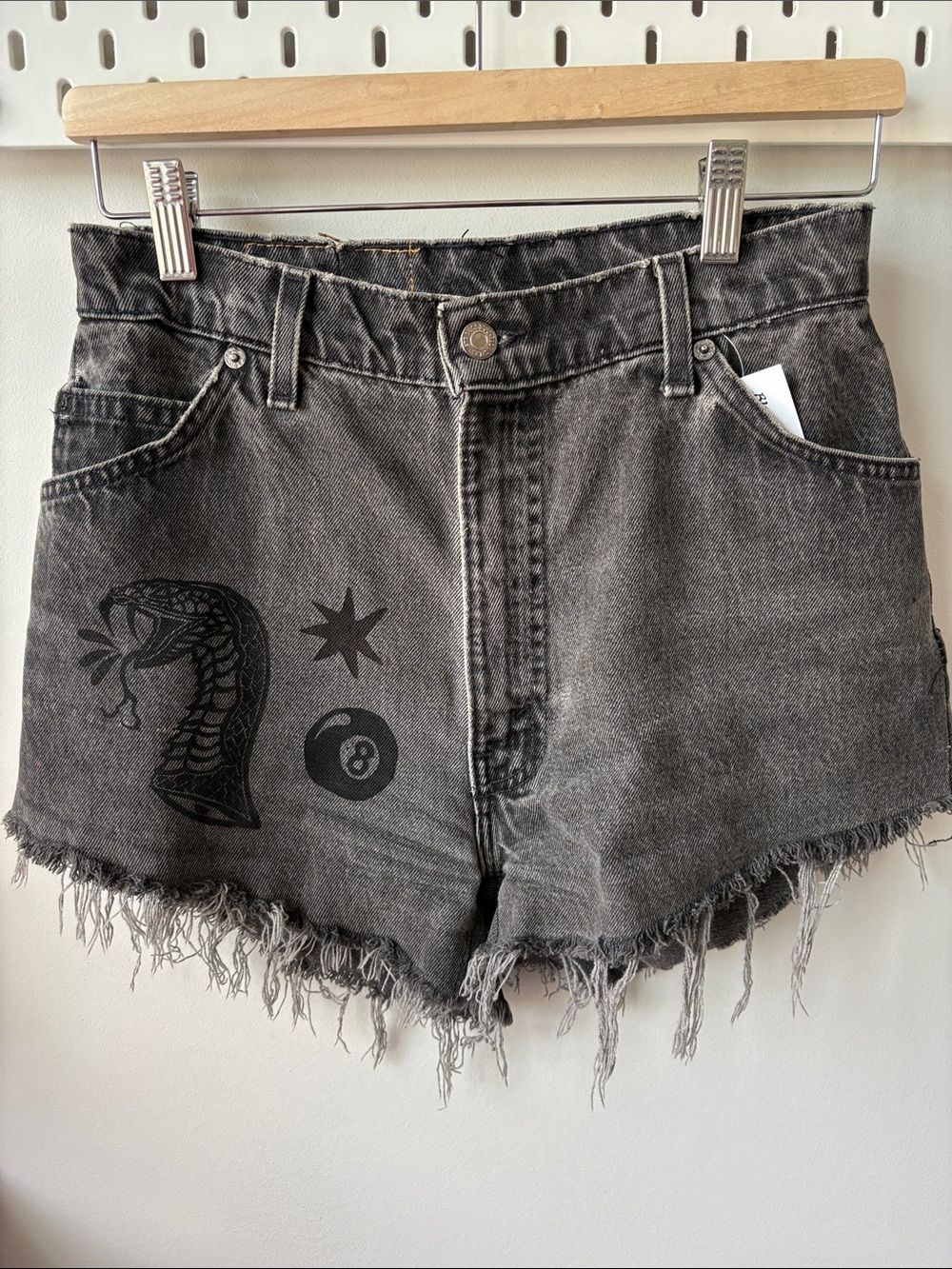 Vintage Levi’s Black Denim Cutoff Shorts with snake print